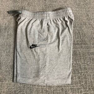 Nike Light Grey Athletic Shorts with Black Logo